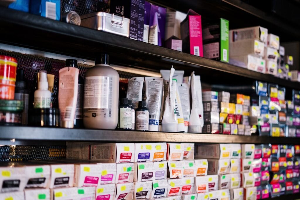 White and Brown Labeled Bottle on Shelf